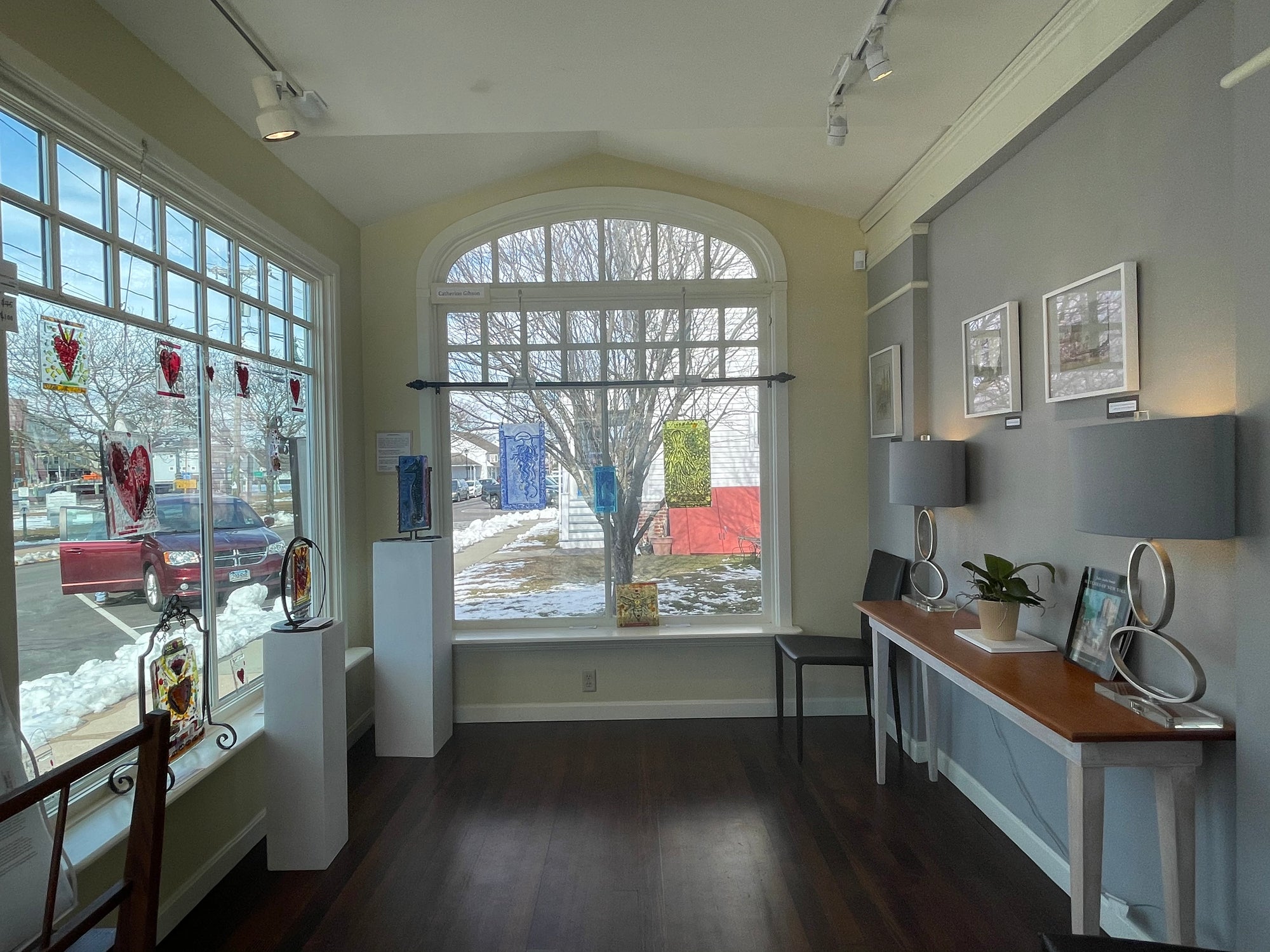 View of left inside front gallery featuring Jules Andre Smith prints and Catherine Gibson fused glass pieces