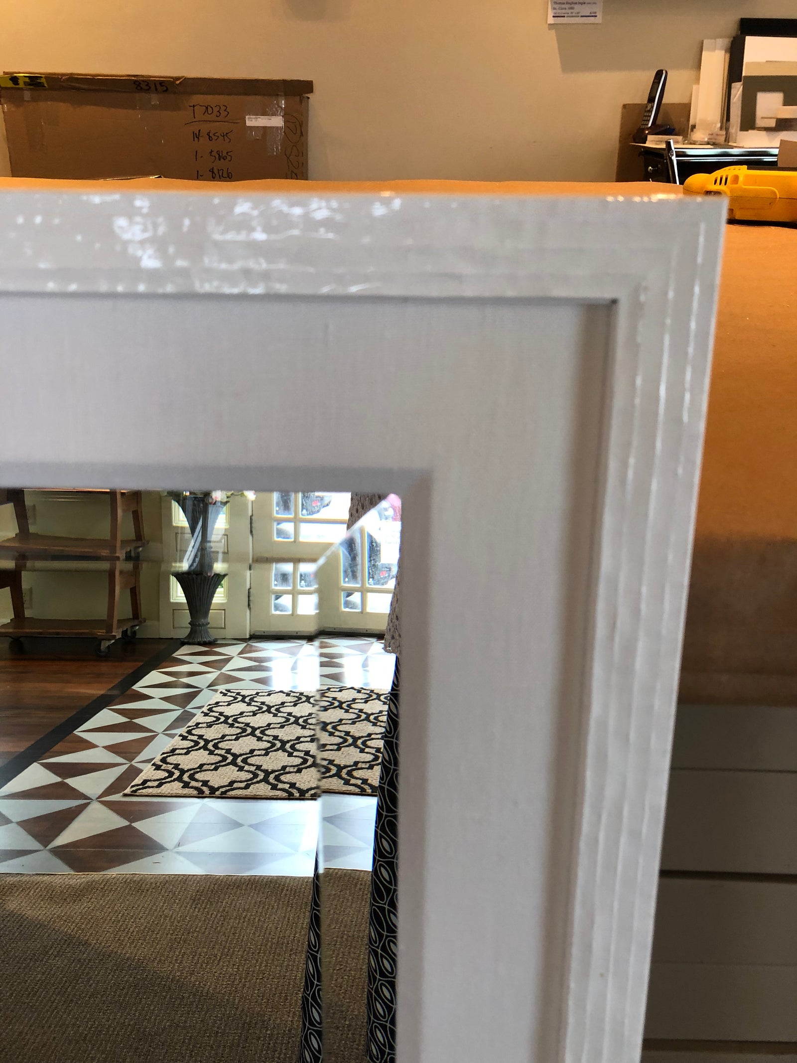 White laquer frame and white linen liner for mirror